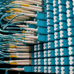 Cable organizer with set of various network wires in switch and connected with equipment