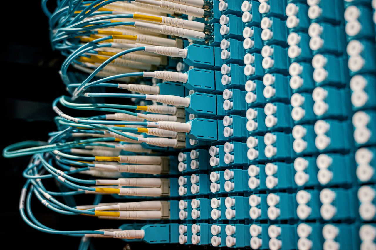 Mastering the First Impression: Your intriguing post title goes here Cable organizer with set of various network wires in switch and connected with equipment